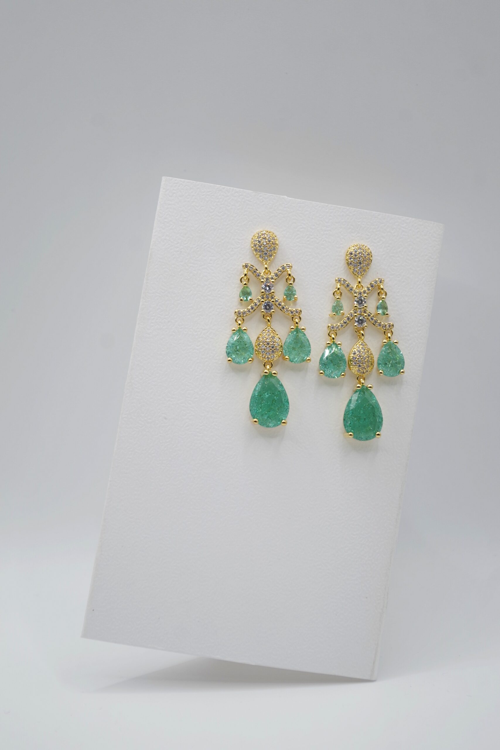 emerald cascade luxe drops – vintage inspired platinum plated zircon tassel earrings emerald cascade luxe drops – vintage inspired platinum plated zircon tassel earrings